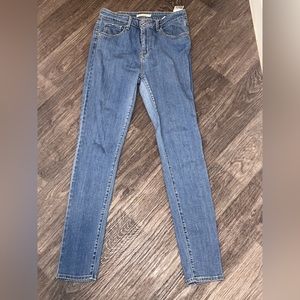 721 High rise skinny jeans